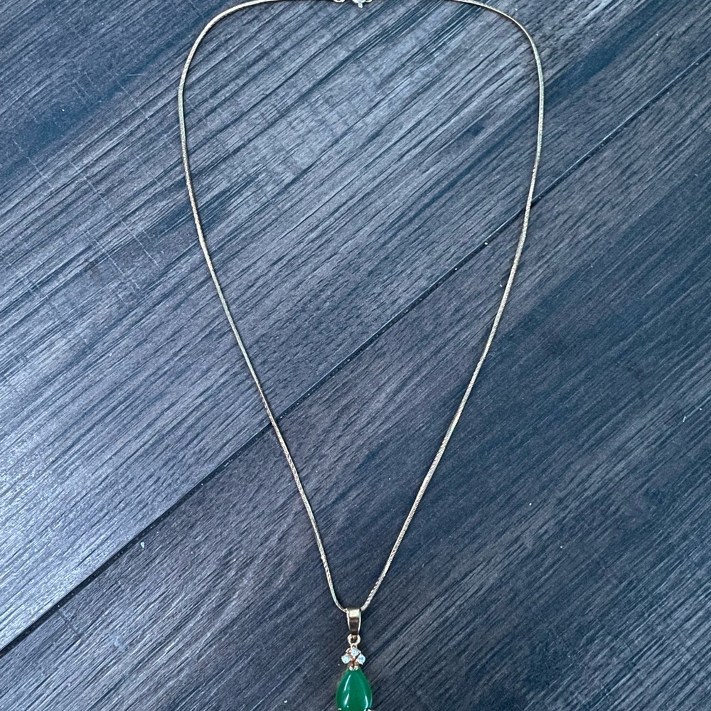 Selling Gold necklace with emerald stone!((fits all)) ((was limited edition))